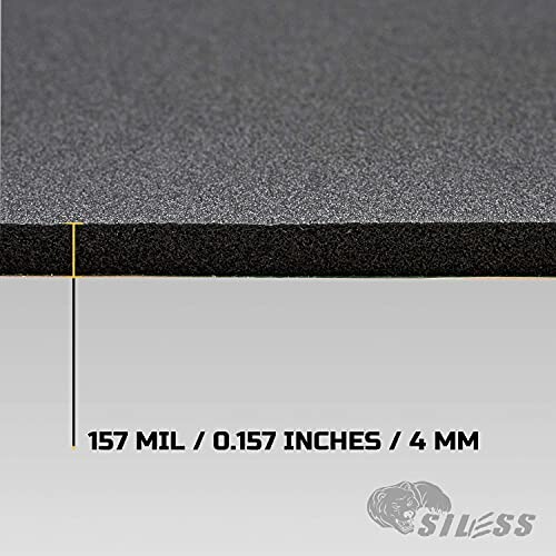 Close-up of acoustic foam panel showing thickness measurement of 157 mil or 4 mm.