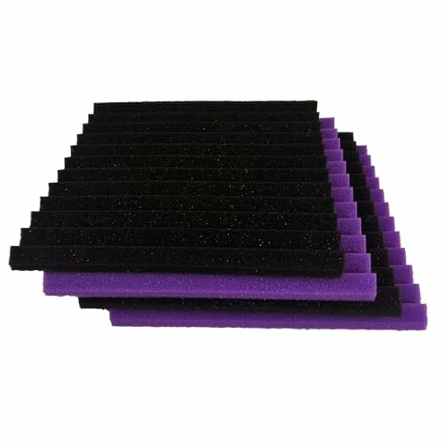 Stack of black and purple acoustic foam panels