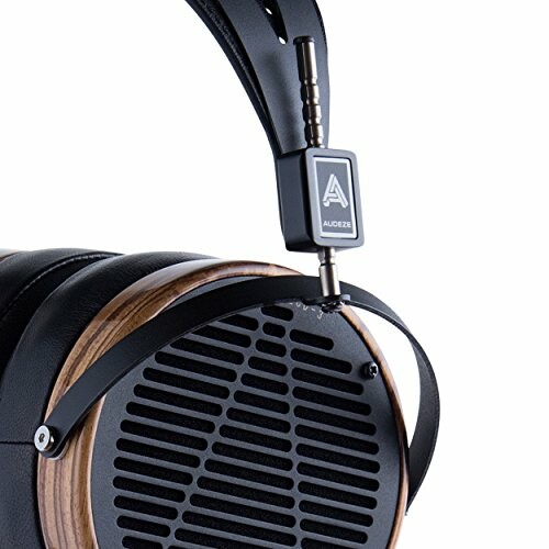 Close-up of Audeze headphones with wooden accents and black grill.