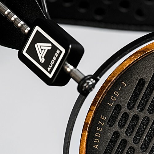 Closeup of Audeze LCD-3 headphones showing logo and design.