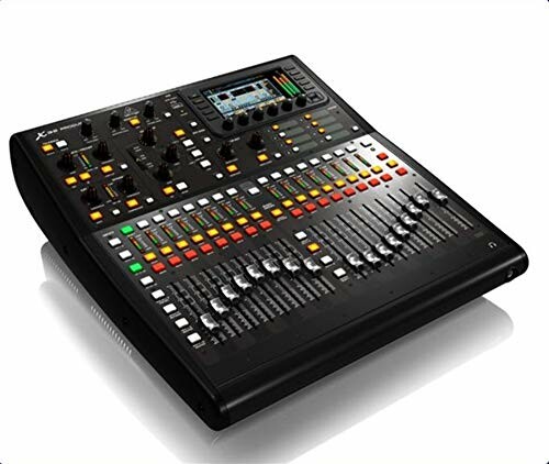 Digital audio mixer console with sliders and buttons.