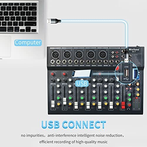 Audio mixer connected to a computer via USB.