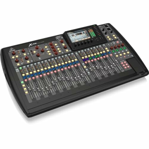 Behringer digital audio mixer with control panel and sliders