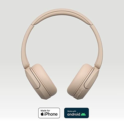 Beige wireless headphones compatible with iPhone and Android.