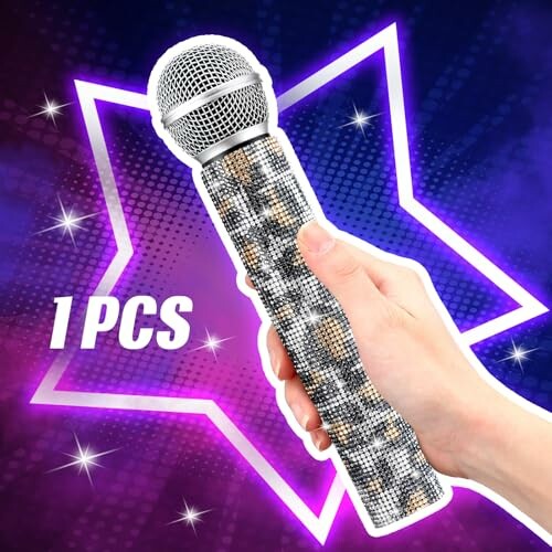 Hand holding a glitter-covered microphone with star background