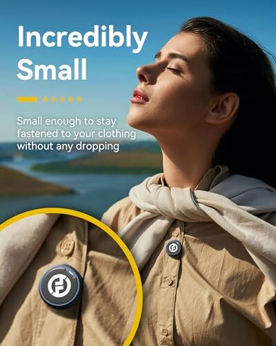 Woman outdoors wearing a small round device on her shirt.