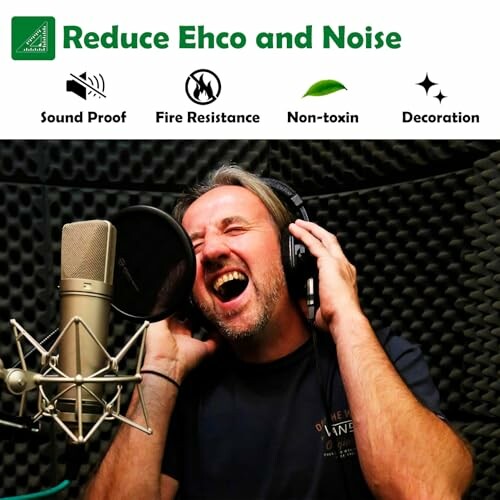 Man singing in a soundproof recording studio.