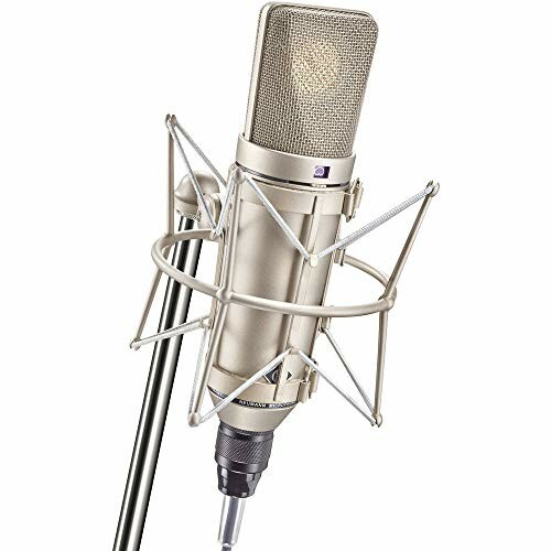 Professional microphone with headphones and audio equipment.